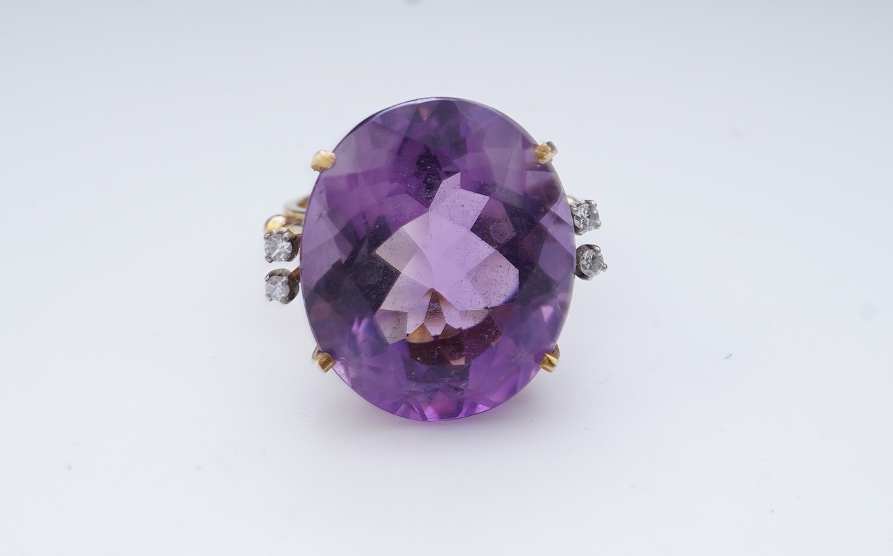 An amethyst and diamond ring